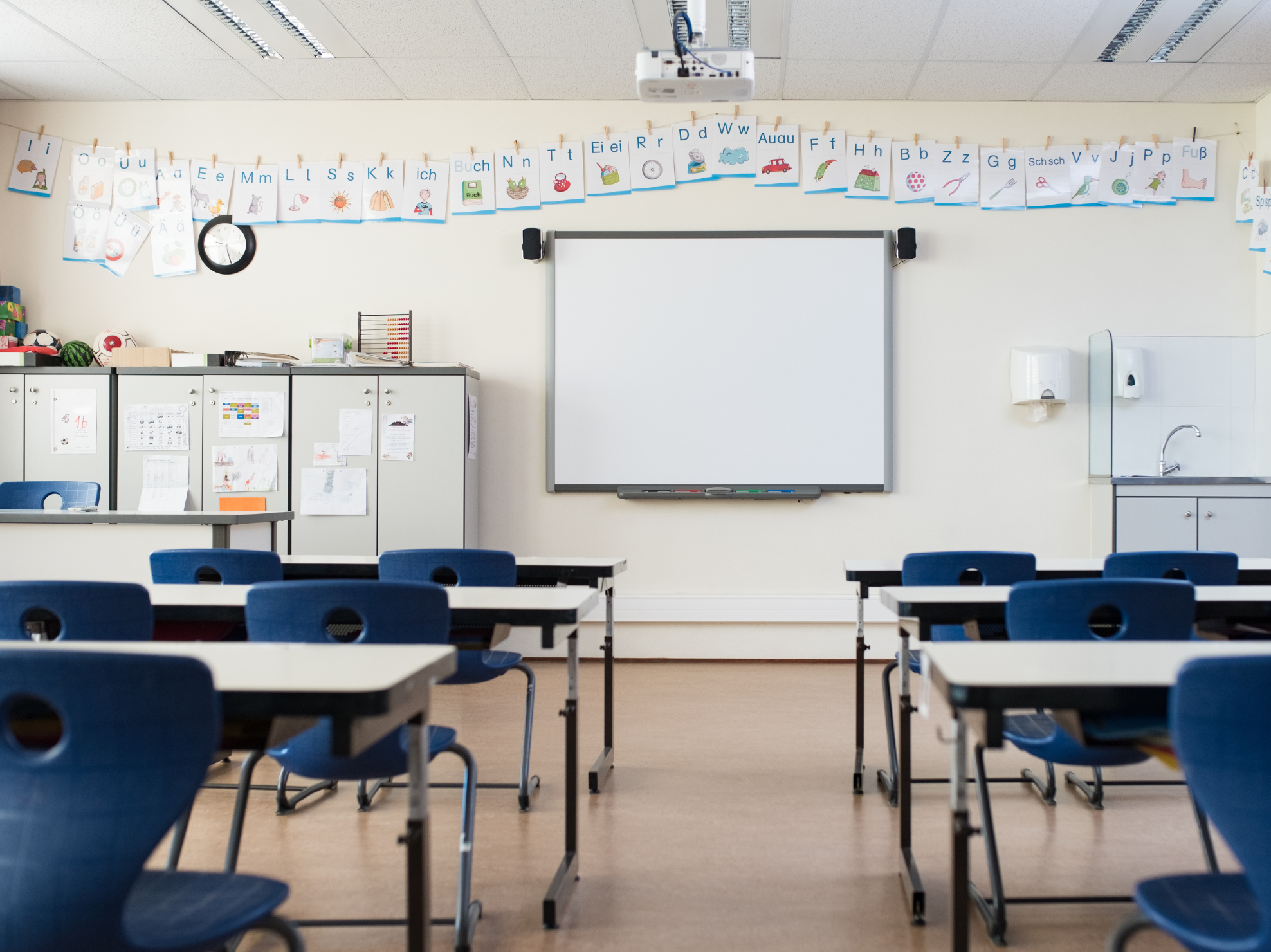 Chronic absenteeism - empty school classroom